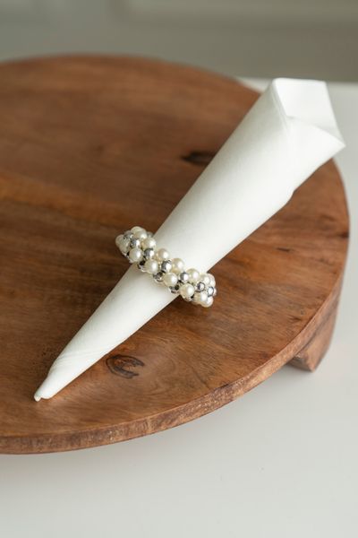 Huvudbild Servettring – Pärlor